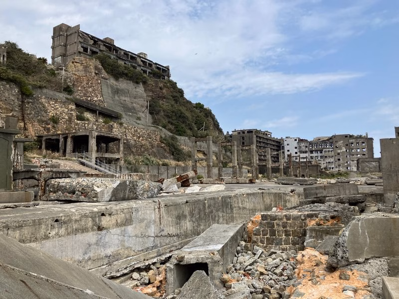 Explore the mysterious beauty and history of ancient ruins under a bright blue sky.